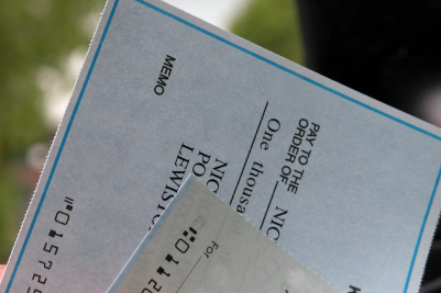 Workers' compensation settlement check symbolizing fair compensation after workplace injury